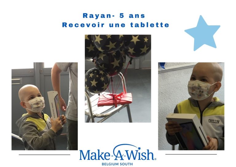 Rayan reçoit sa tablette et son sourire en dit long derrière son masque